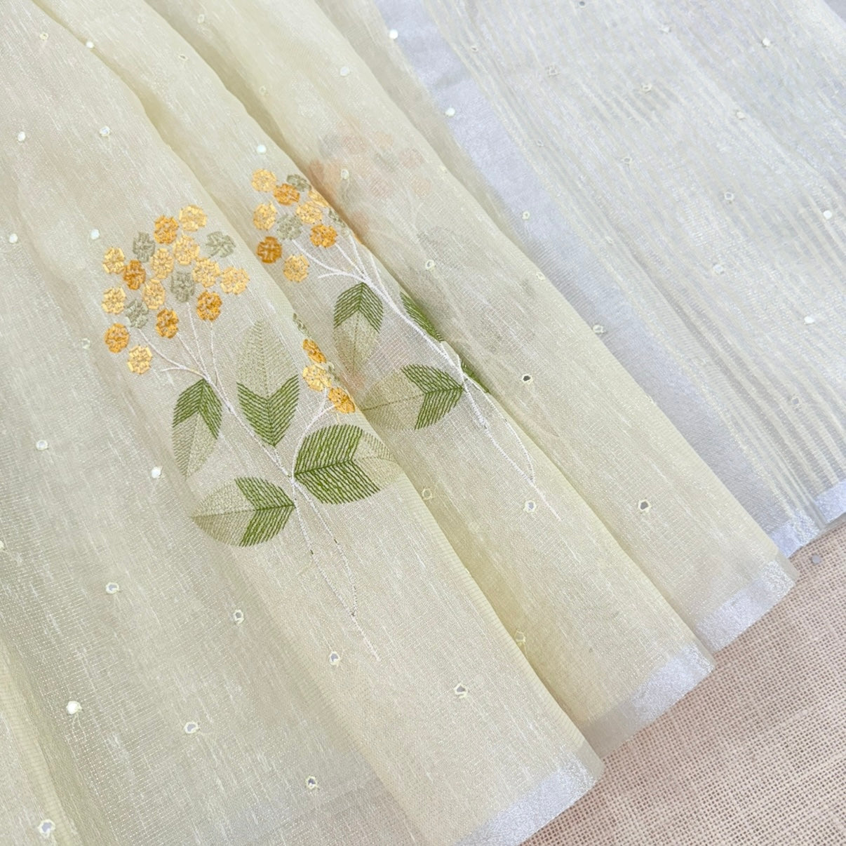 Pastel Yellow Floral Embroidery Tissue Linen Saree