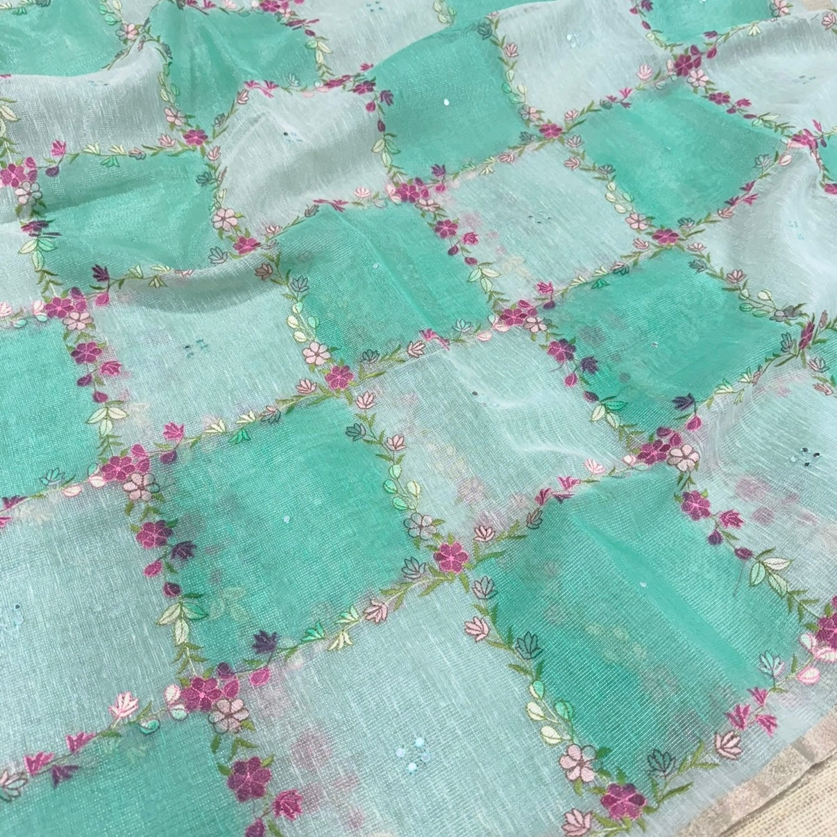Teal Green Floral Embroidery Tissue Linen Saree