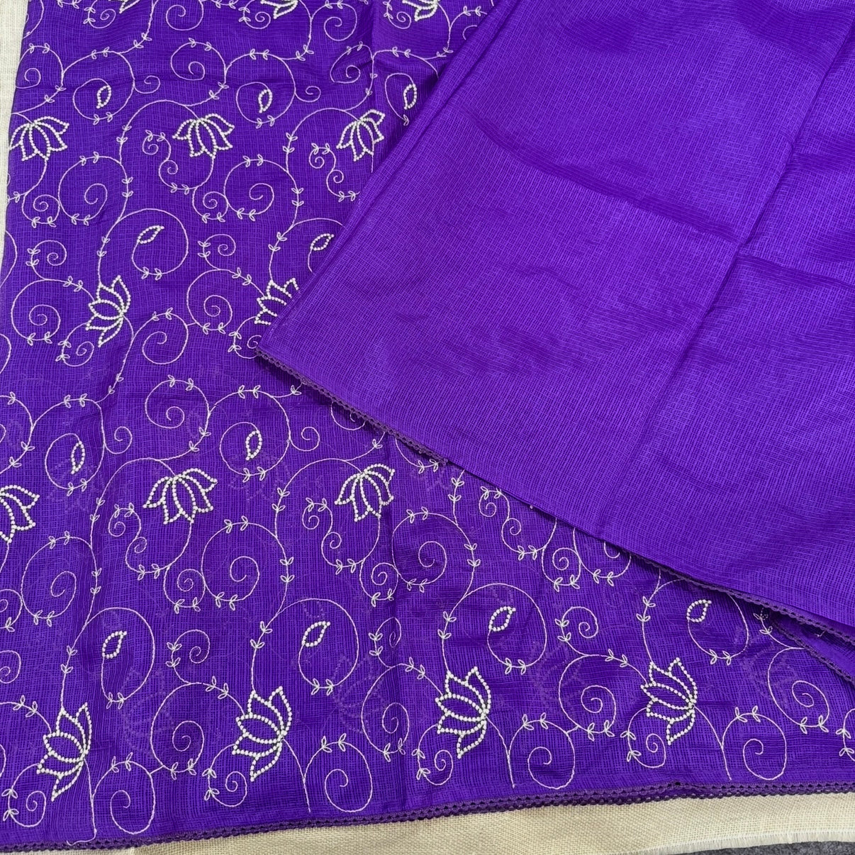 Lightweight purple Kota cotton saree draped for festive daytime wear