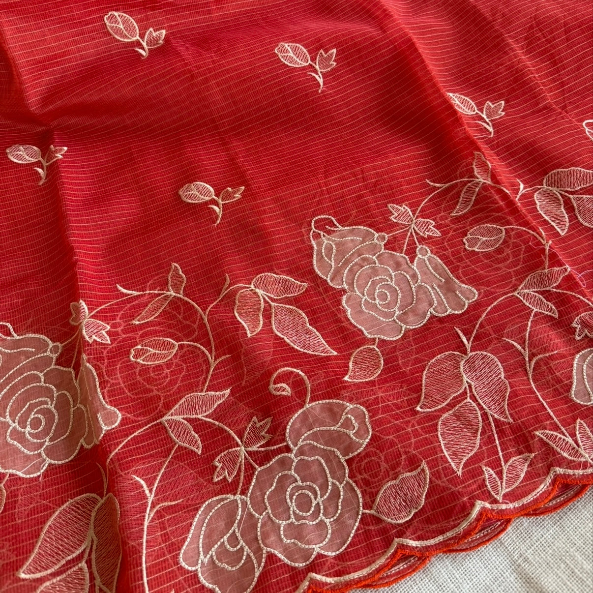 Vibrant Orange Kota Tissue floral Embroidery Saree