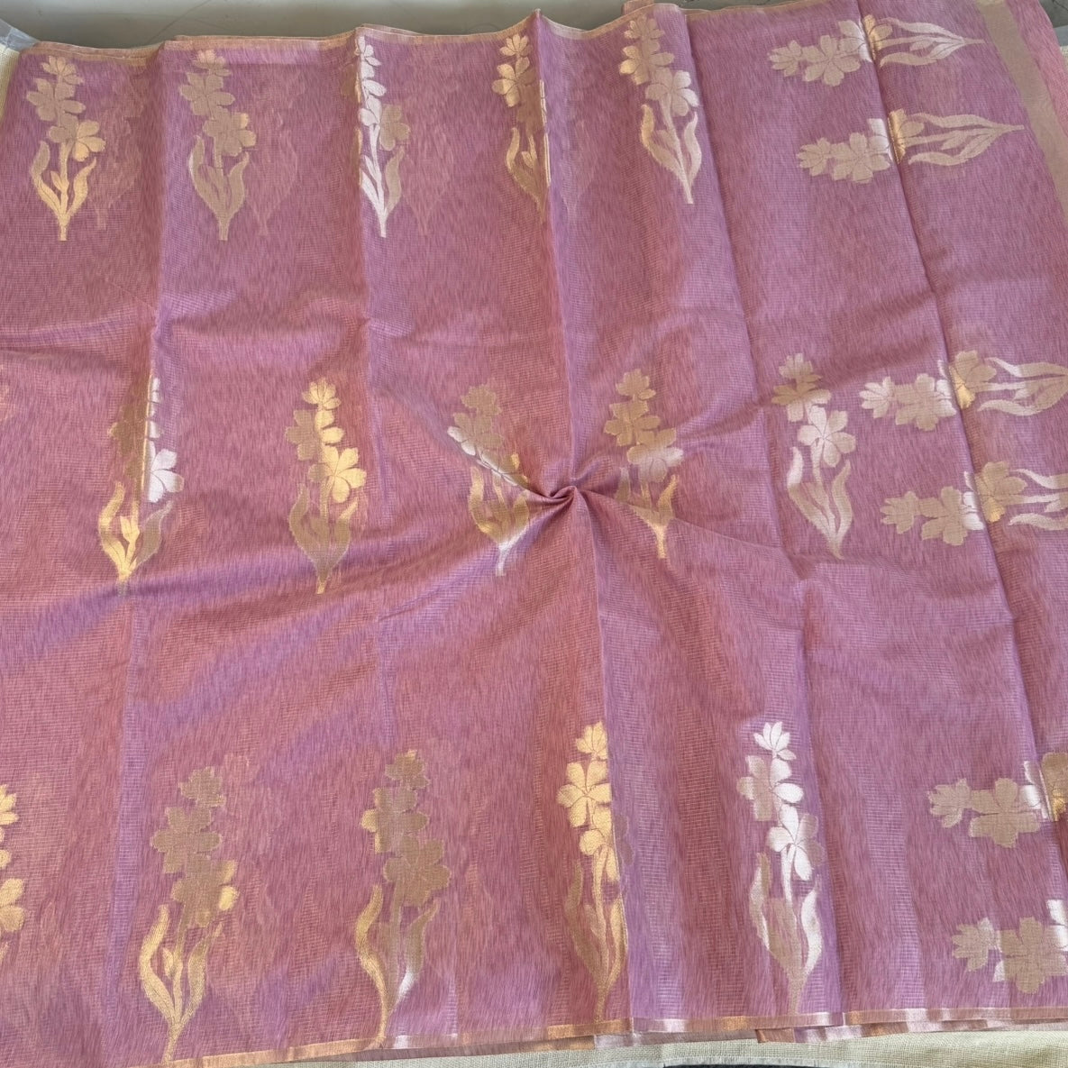 Onion pink paper silk saree with fine zari lines and floral zari weaving