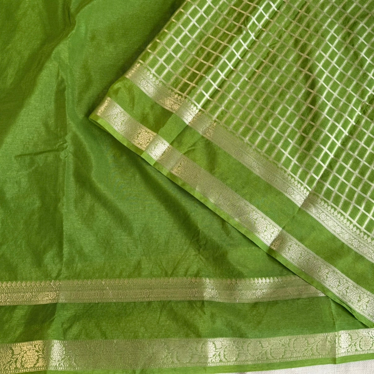Green Plain Raw Silk Saree Checked Blouse