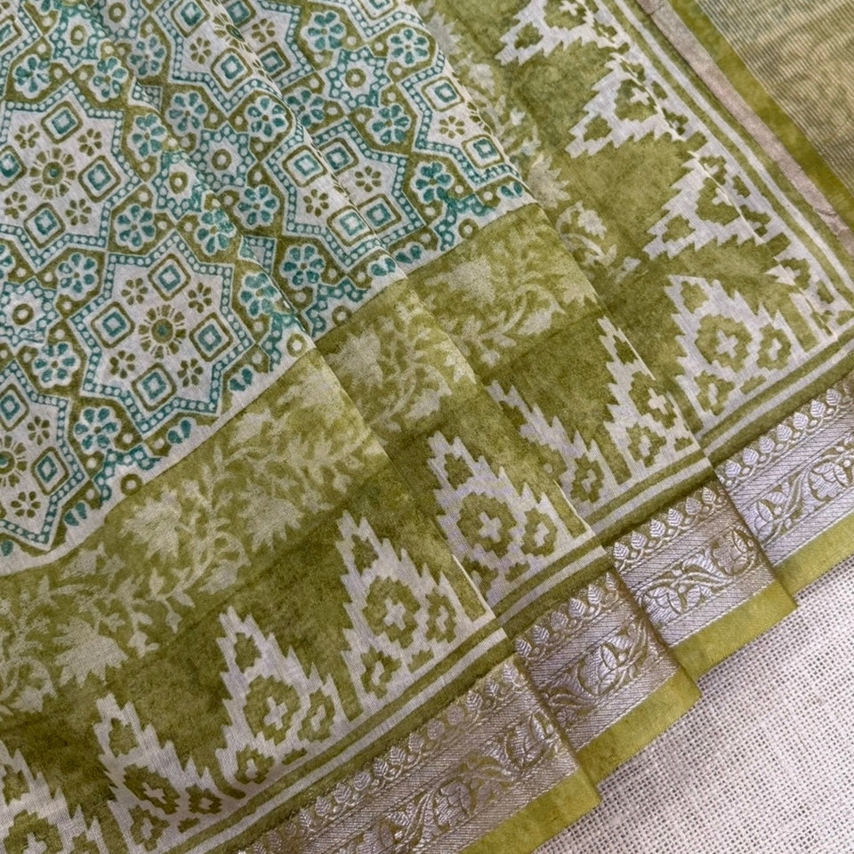 Green Maheshwari silk cotton saree with Ajrakh inspired print and printed border