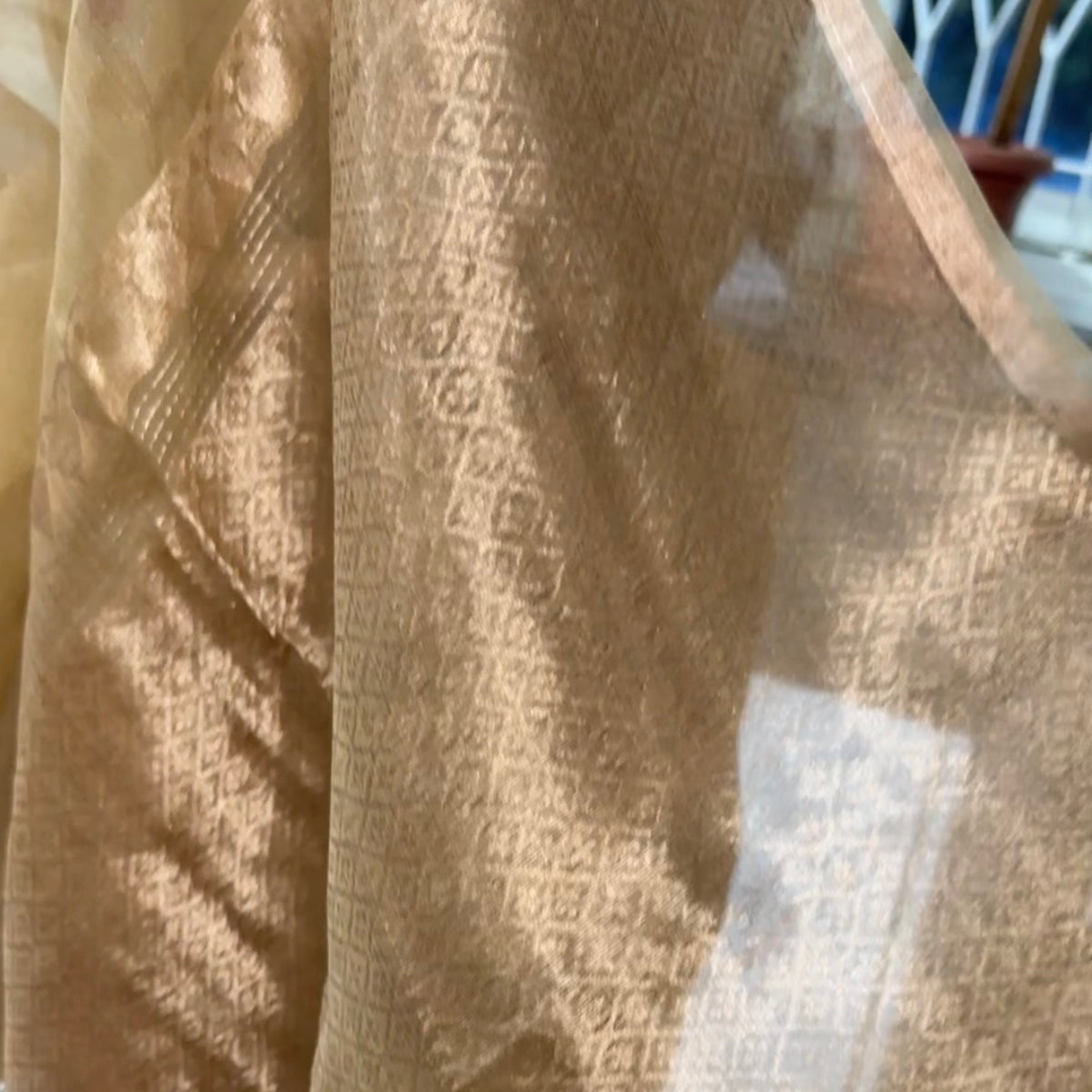 Gold and silver zari butta weave on beige Kora muslin silk saree