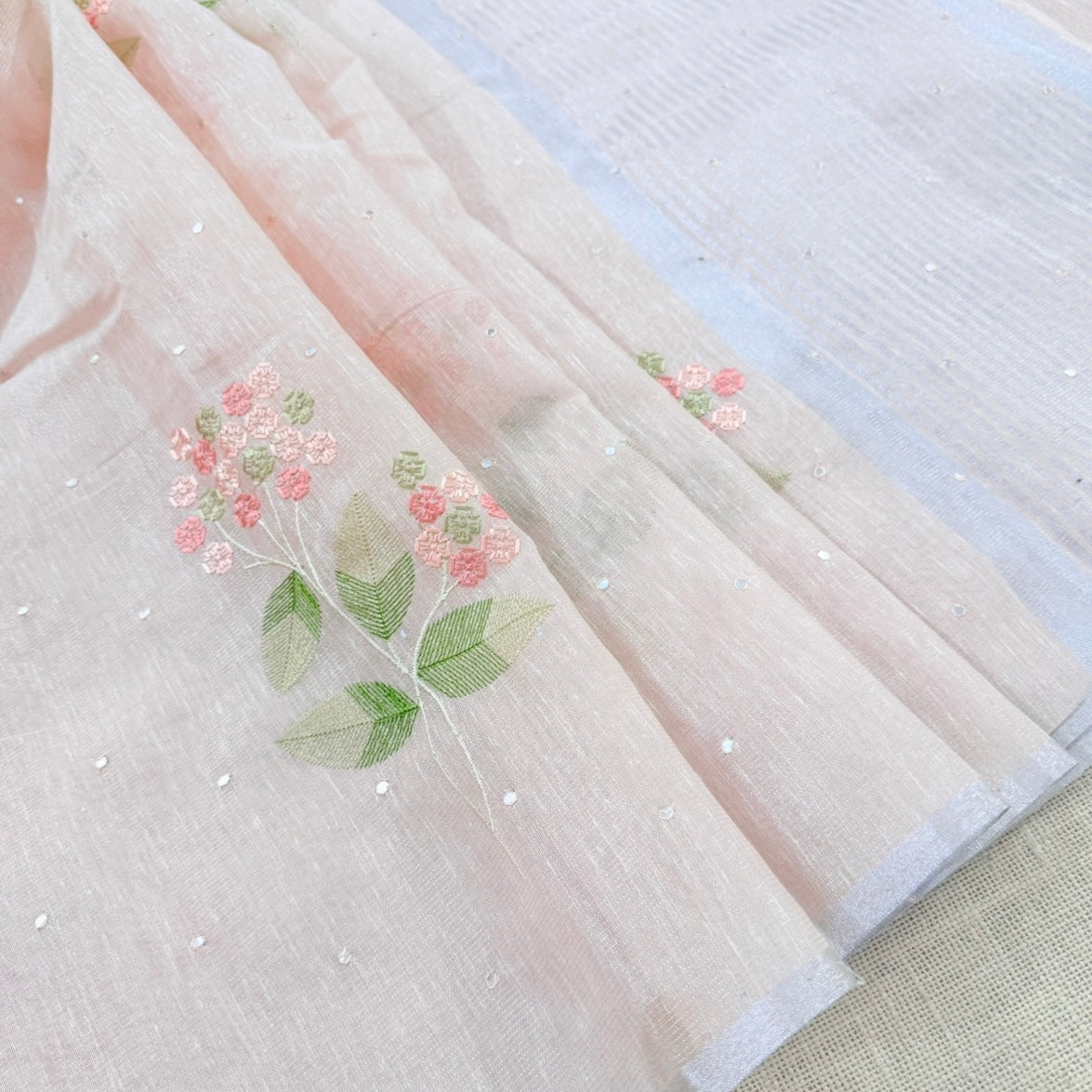 Pastel Peach Floral Embroidery Tissue Linen Saree
