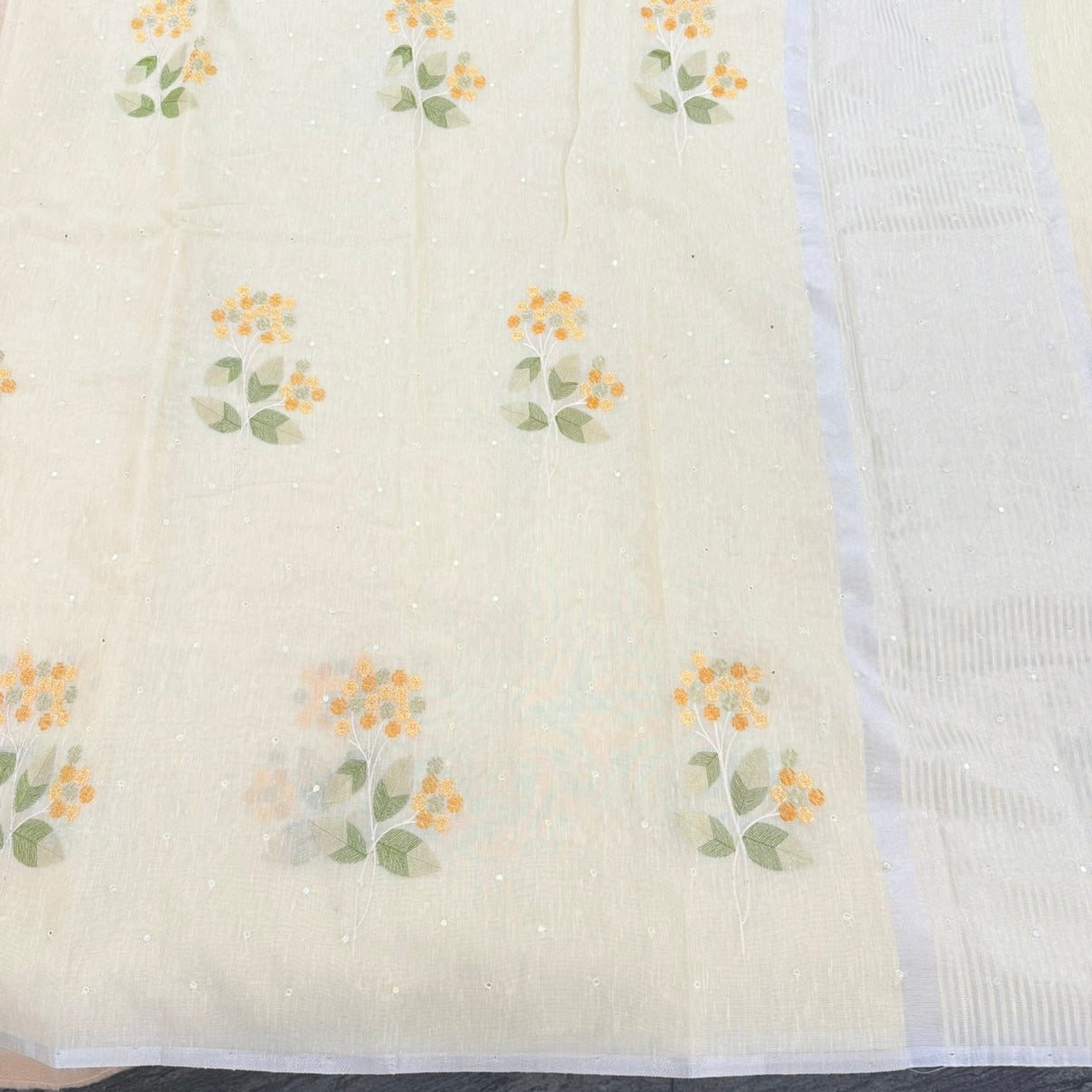 Pastel Yellow Floral Embroidery Tissue Linen Saree
