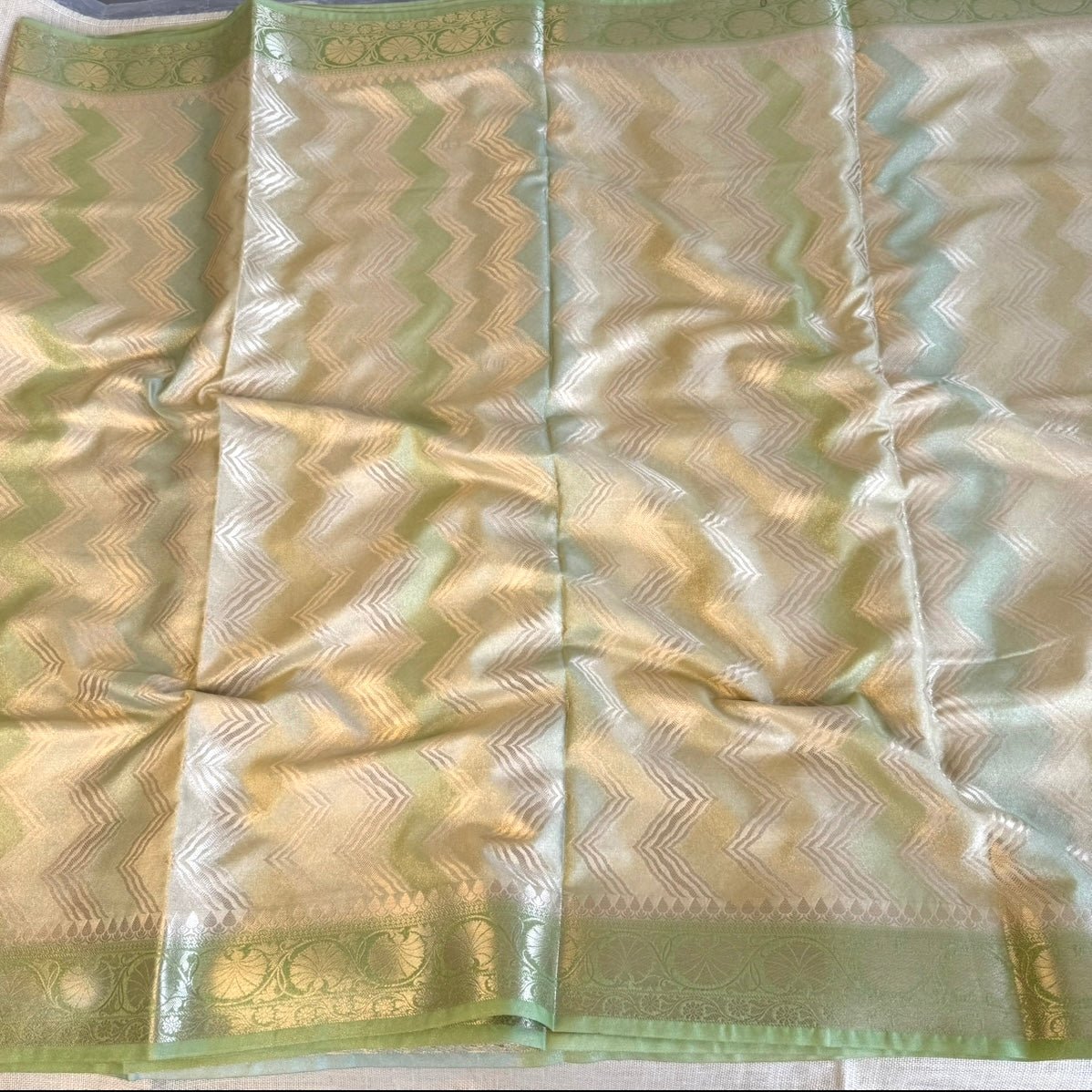 Green Zigzag Shimmer Tissue Silk Saree - Vini's Ethnic