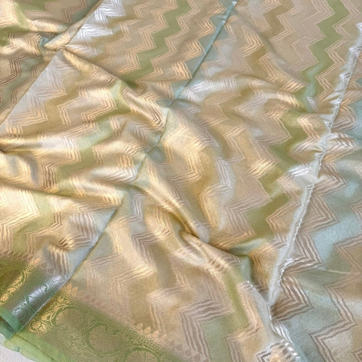 Green Zigzag Shimmer Tissue Silk Saree - Vini's Ethnic