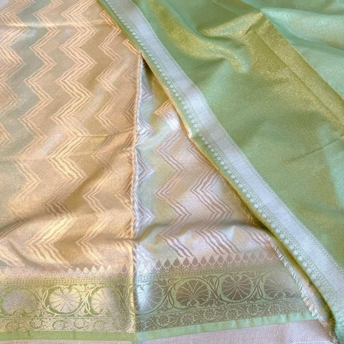 Green Zigzag Shimmer Tissue Silk Saree - Vini's Ethnic