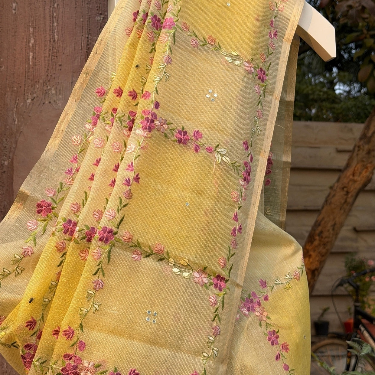 Yellow Floral Embroidery Tissue Linen Saree