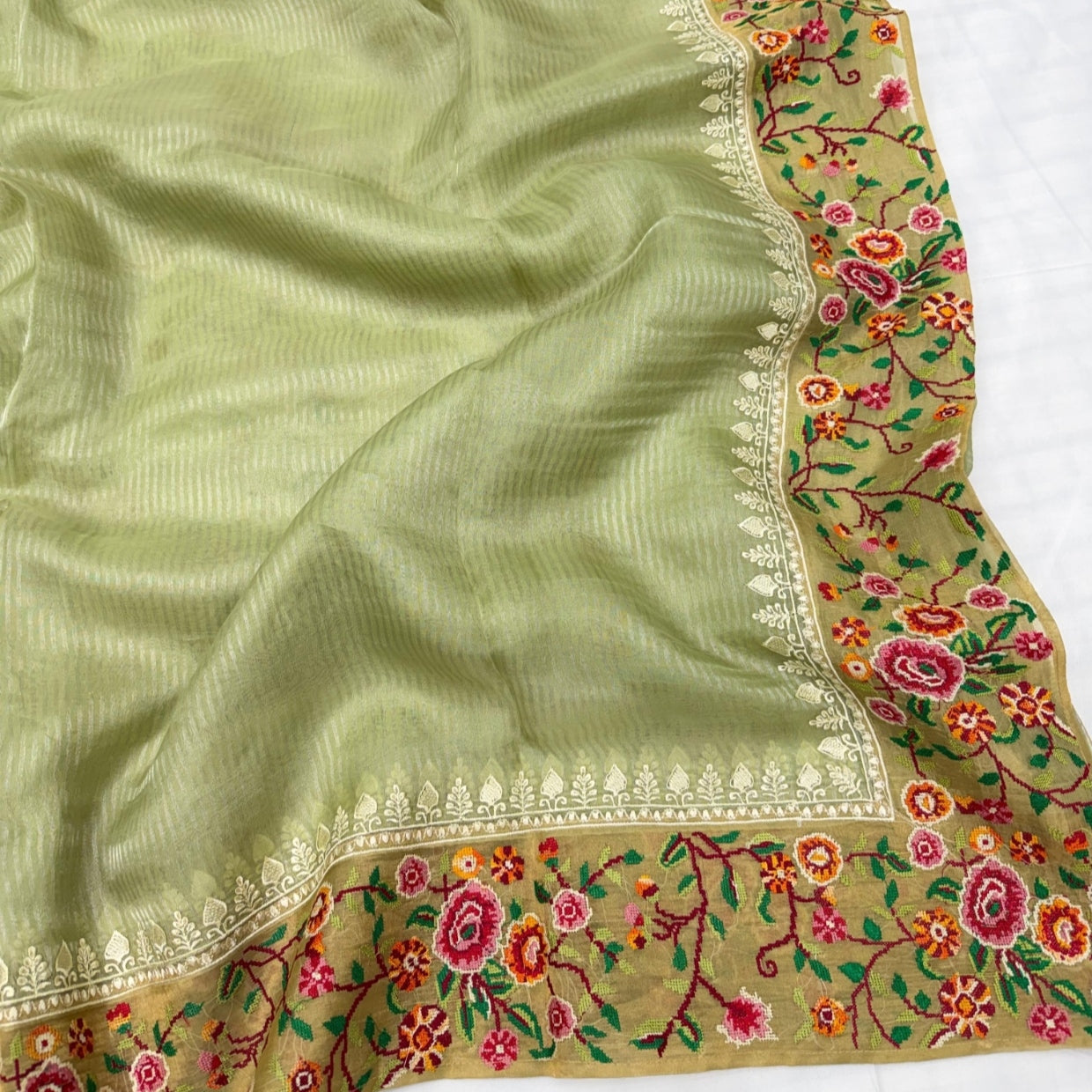 Pista Green Pure Tissue Petit Embroidery Saree